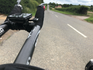 Cycling through Bytham (on tri bars)