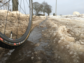 Cycling in the snow - meltwater in Skeyton