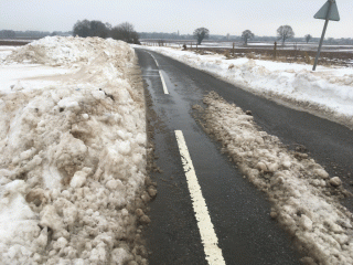 Banks of snow on the road at Badersfield